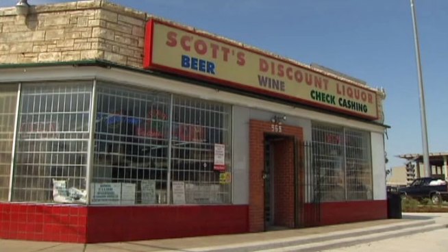 The owner of Scott's Liquors on South Lamar Streets says he's in a dispute with Dallas City Hall over parking at his business.