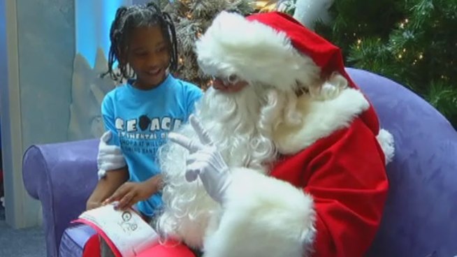 Deaf and hearing-impaired children visited with an ASL-fluent Santa Claus at the Shops at Willow Bend in Plano.