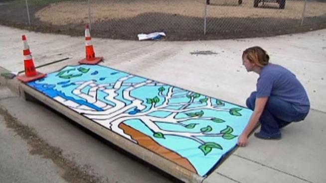 North Texas artist Kiba Jacobson is decorating storm drains in Denton with art in hopes of drawing attention to a water issues in the city.