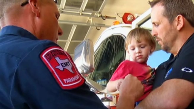 2-year-old Devin Peters met the Trophy Club firefighters who saved his life when he fell into the family's pool in January.