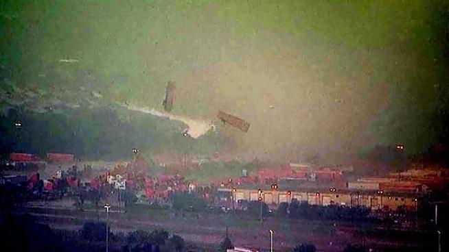At 1:34 p.m. Chopper 5 shows 18-wheelers being thrown into the air by the tornado near I-20 and Bonnie View Road.