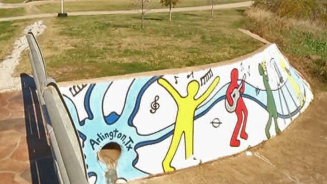 Once covered in graffiti, a wall in an Arlington neighborhood has been transformed into a piece of public art.