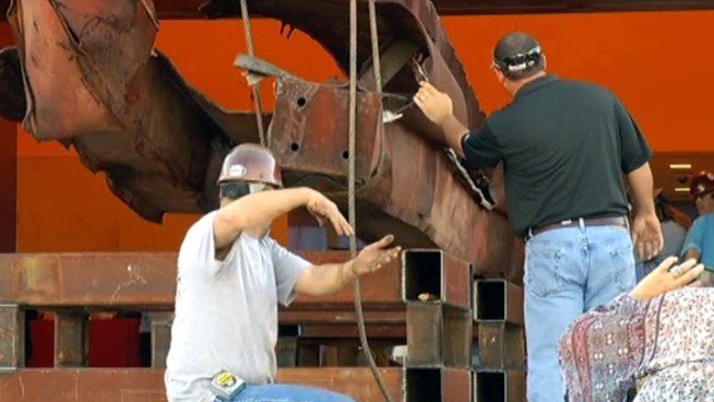 A 36-foot tall beam from the World Trade Center is moving to its new home inside the Fort Worth Museum of Science and History.