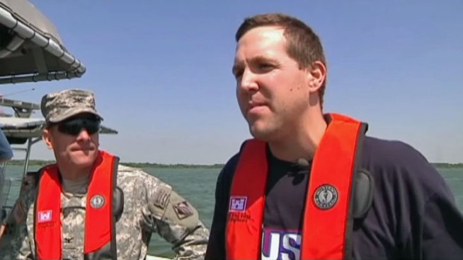 Former Olympic gold medalist and swimmer Neil Walker promoted water safety at Lewisville Lake on Friday.