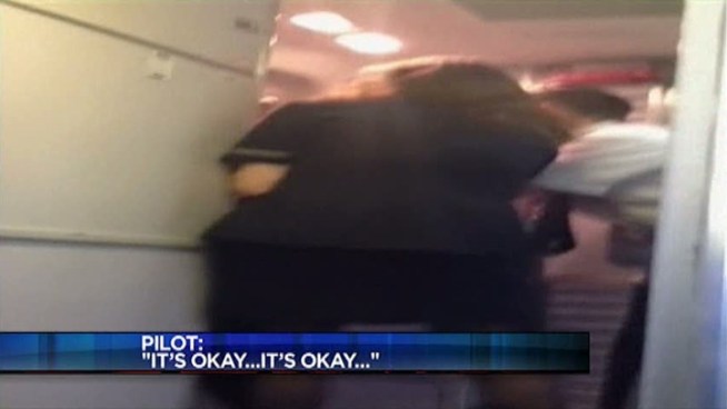 An American Airlines flight attendant went on an emotional rant over the public address system on a flight leaving DFW Airport. Cellphone video from a passenger shows a female flight attendant and an off-duty pilot who sitting in first class try to calm down their agitated co-worker.