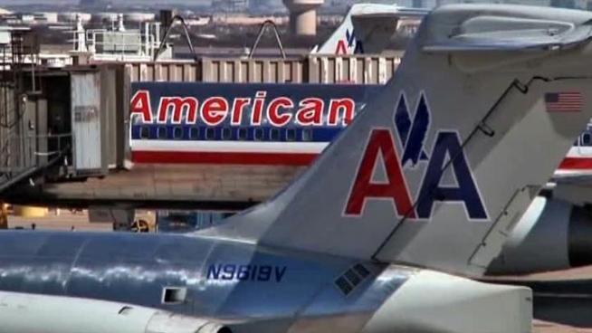 The stock of American Airlines parent AMR Corp. plunged 33 percent Monday on fears that the Fort Worth-based company may be flying into bankruptcy.