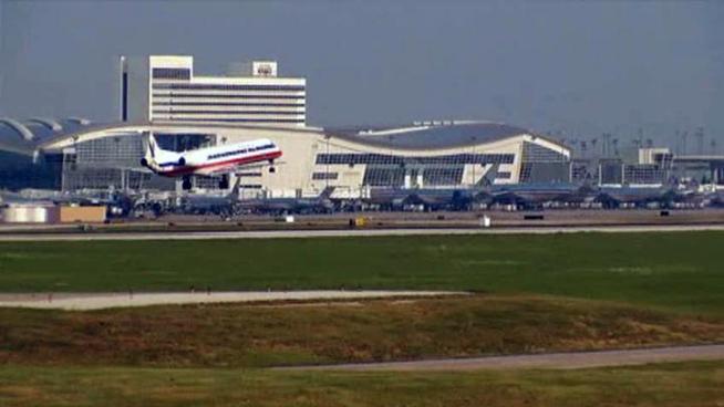 An American Eagle employee is accused of pocketing $120 from a traveler to change a flight when no such fee was required.