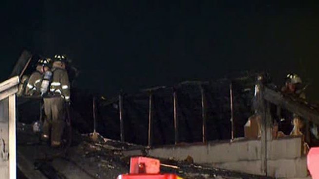 A Fort Worth apartment complex office caught fire early Wednesday morning sending flames into the darkened sky.