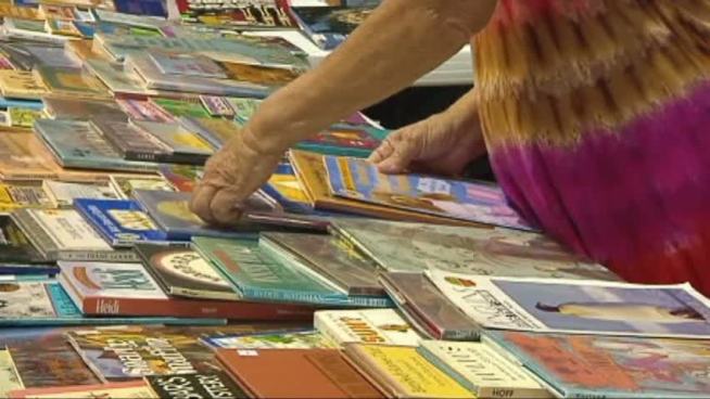 A local church gives uniforms and books to school-age children.