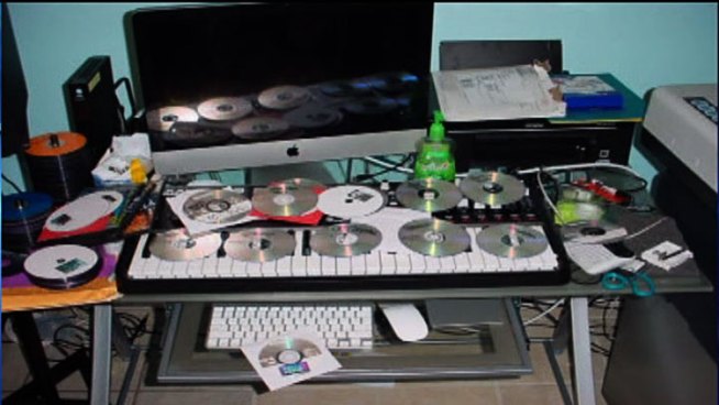 Melbert Randles was arrested when Arlington police found nearly 600 bootleg DVDs while breaking up a counterfeit DVD operation.