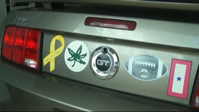 A Plano couple is frustrated after a Tennessee State Trooper questioned them about an Ohio State bumper sticker on their car.