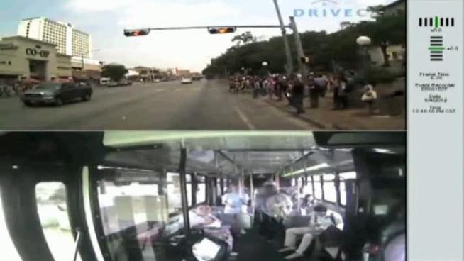 Dashboard camera video from a bus that struck a University of Texas freshman from Rockwall shows the driver was accelerating through a yellow light when he hit the student.