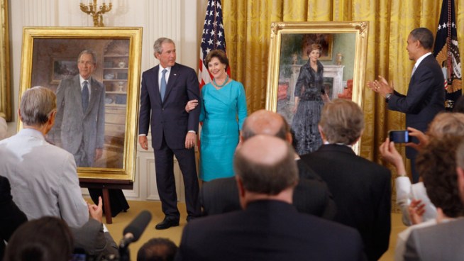Dallas residents former President George W. Bush and former first lady Laura Bush were at the White House for the unveiling of their official portraits, where politics gave way to a few laughs.