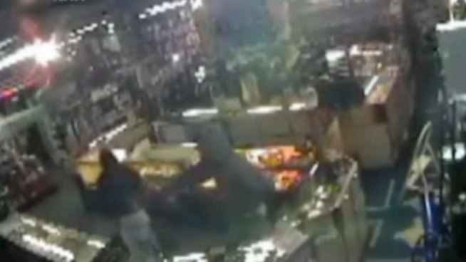 Denton police need help identifying two armed men caught on video robbing convenience stores.