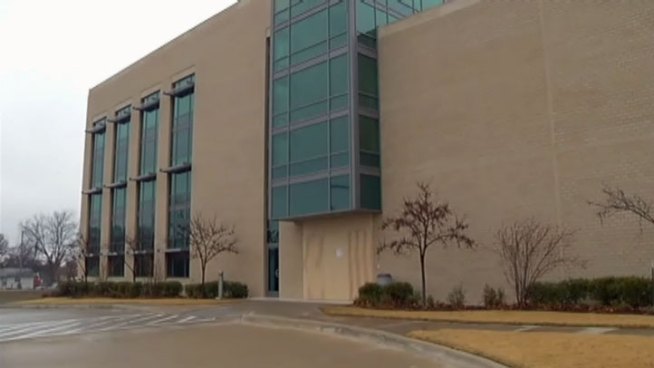 Police say someone drove a truck into the front of the Tarrant County sub-courthouse on Abrams Street in Arlington in an attempt to steal an ATM.