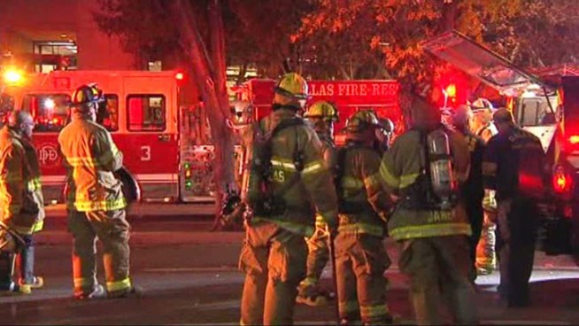 A fire sparked by a welding torch burned on the roof of the Plaza of the Americans building in downtown Dallas.