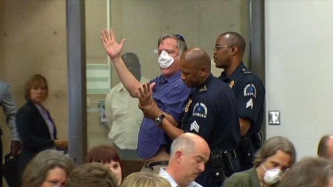 The fight over natural gas well drilling at Dallas City Hall heated up Wednesday, with opponents getting thrown out for interrupting the meeting.
