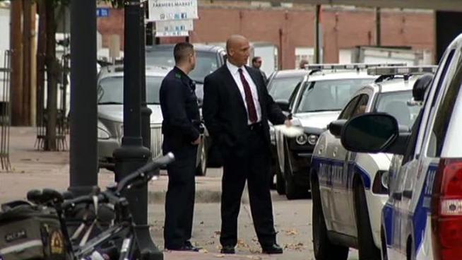 Dallas police have two men in custody in connection with the shooting of two men in an apartment complex parking garage.