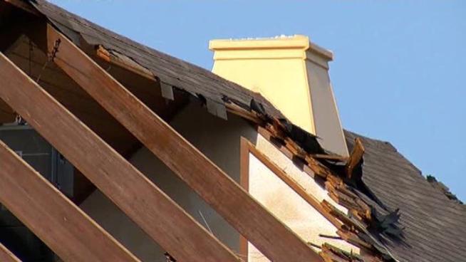Intense winds tore the roof and snapped the steeple off the church.
