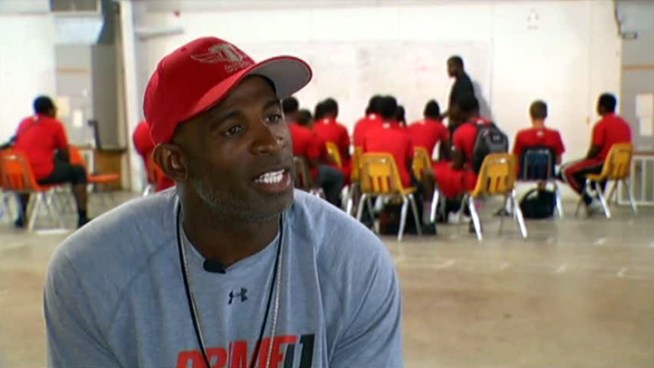 Deion Sanders says he has opened a school instead of just coaching a team so he can provoke change.