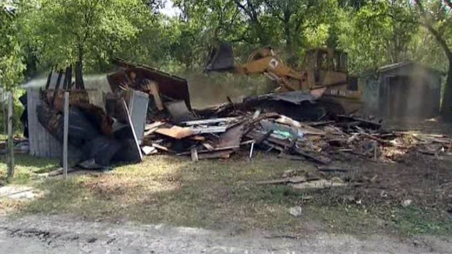 A Dallas program to rid neighborhoods of vacant building with many complaints celebrated 250 demolitions on Thursday.