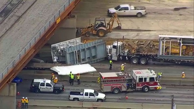 An accident involving several semi trucks has closed down State Highway 360 at the Division Street bridge.