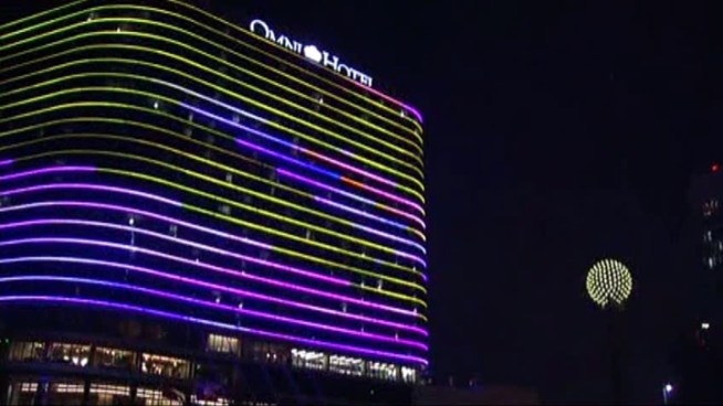 A group of architects and designers discuss whether the colored lights of the Dallas skyline are too much.