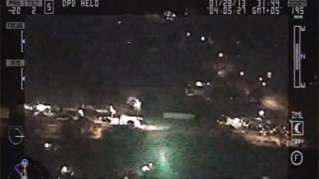 A Dallas man has been arrested in a laser strike on a police helicopter that was assisting officers who were looking for a car burglar.