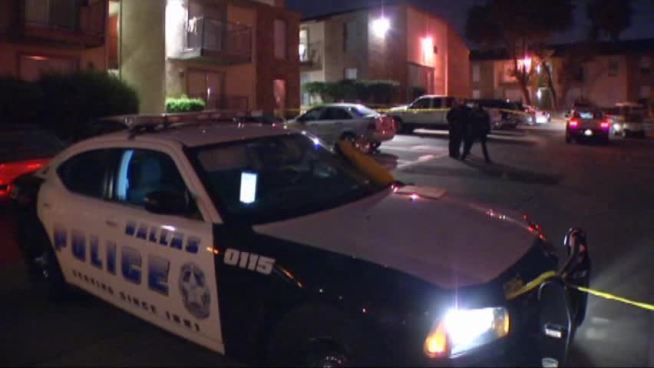 Dallas police say they are questioning a person of interest in the shooting of an officer.