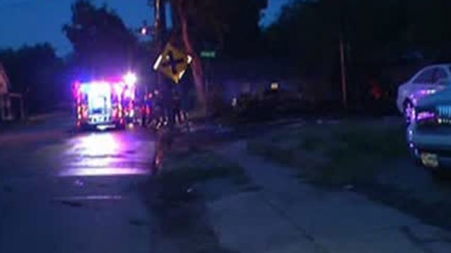 Firefighters battled a house fire Monday morning not far from the site of the State Fair of Texas.