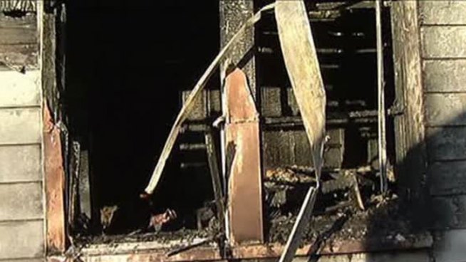 A woman died Wednesday morning after a fire ripped through her home in south Fort Worth.