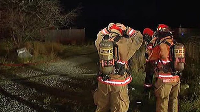 Several firefighter crews tried to contain a 2-alarm mobile home fire in the unincorporated part of Tarrant County on Tuesday night.