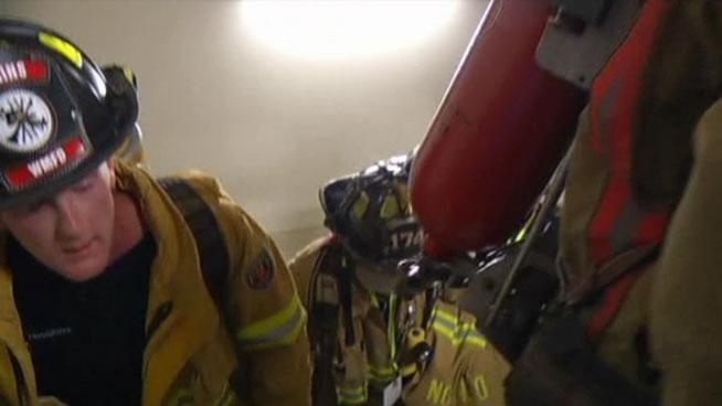 Firefighters from across Texas climbed stairs at the Renaissance Tower in Dallas in memory of the FDNY firefighter showwho died on 9/11.