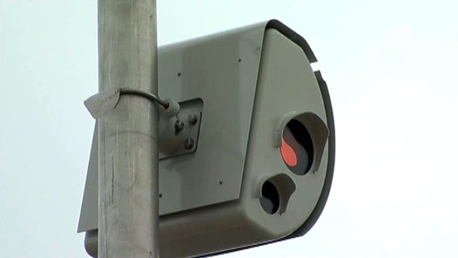 After a nearly two-year hiatus, red-light cameras are going up at two busy <a title=