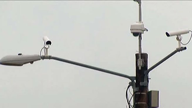 Signs are out near the intersection of Legacy Drive and Main Street in Frisco warning drivers about the new red light camera.