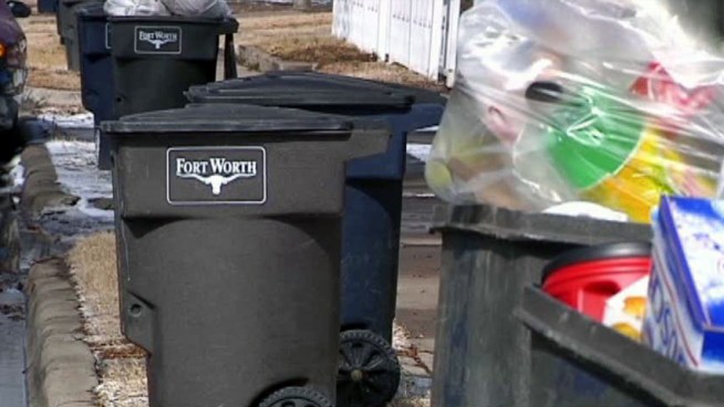 Road crews were out early to sand ice-prone areas, but trash service has been delayed.