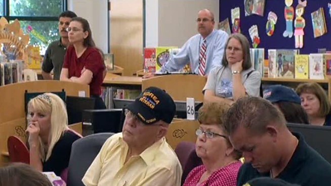 More than 100 people attended a public meeting about West Nile virus in North Fort Worth.