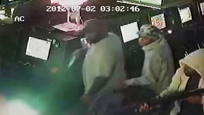 Fort Worth police hope new surveillance video can help them catch four robbers who shot a man Monday morning.