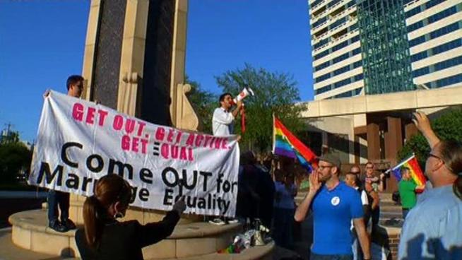 Dozens of gay rights supporters applauded President Barack Obama's statement on gay marriage, but a Dallas pastor said he doesn't agree with the president's position. Obama said in an interview Wednesday that he believes same-sex couples should be able to get married.