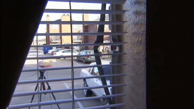 Police shot and injured an armed robbery suspect who ran into a Grand Prairie apartment complex on Friday afternoon. One of the three shots fired during the incident struck a family's apartment.