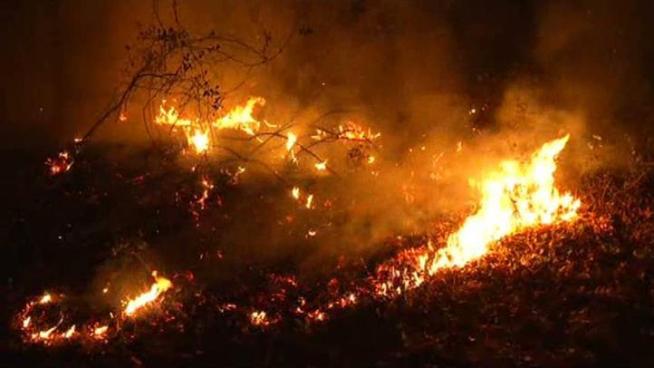 At least 12 structures were destroyed Thursday after a wildfire broke out near Lake Whitney.