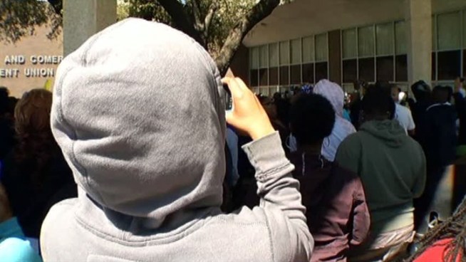 A rally in Dallas at Paul Quinn College organized over Twitter in less than 24 hours calls for an arrest in the shooting death of a 17-year-old in Florida.