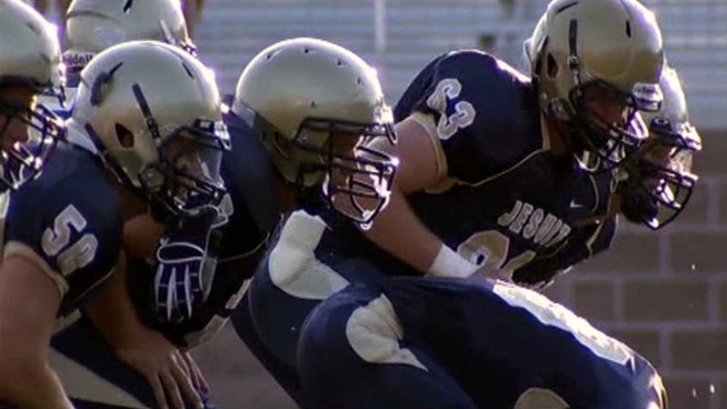 High school football is back. And this year, it's also tackling triple-digit heat.