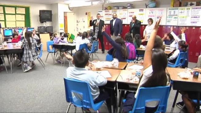 Franco Harris and Lydell Mitchell inspired students to eat healthy and stay active.
