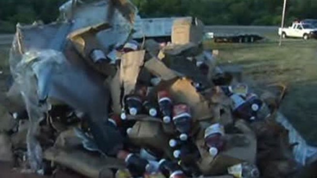 A big-rig crash caused 21 tons of juice to spill along the westbound Loop 12 ramp onto Interstate 30.