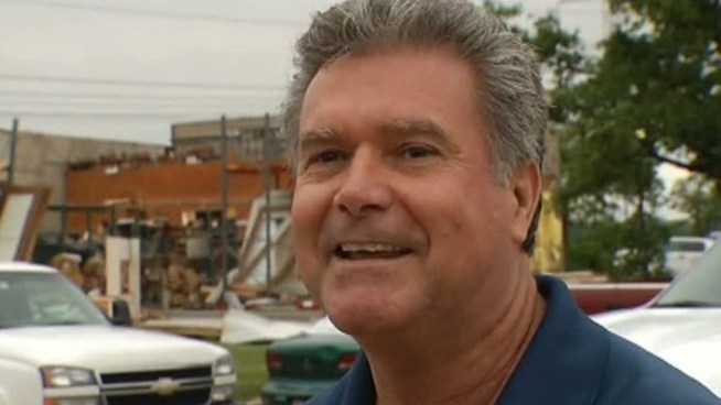 Steve Stewart and dozens of other volunteers from Trican Well Service begin cleanup efforts in Kennedale.