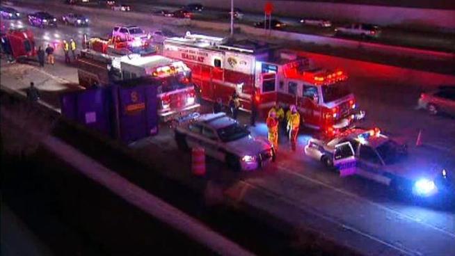 A crash involving a Dallas police cruiser and an 18-wheeler snarled traffic on Interstate 635.