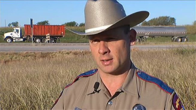 The driver of a big-rig was killed early Thursday after being ejected from the cab of his truck and hit by a passing pickup.