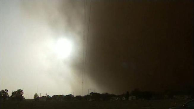 A strong cold front bringing north and west winds gusting to 60 mph churned up a dust storm.