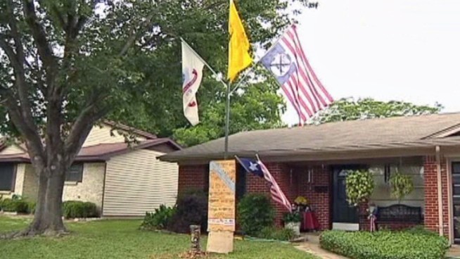 A Mesquite man's yard display upsets some residents. Part of it includes a sign that reads 